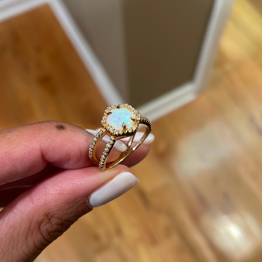 Opal and cubic zirconia ring.